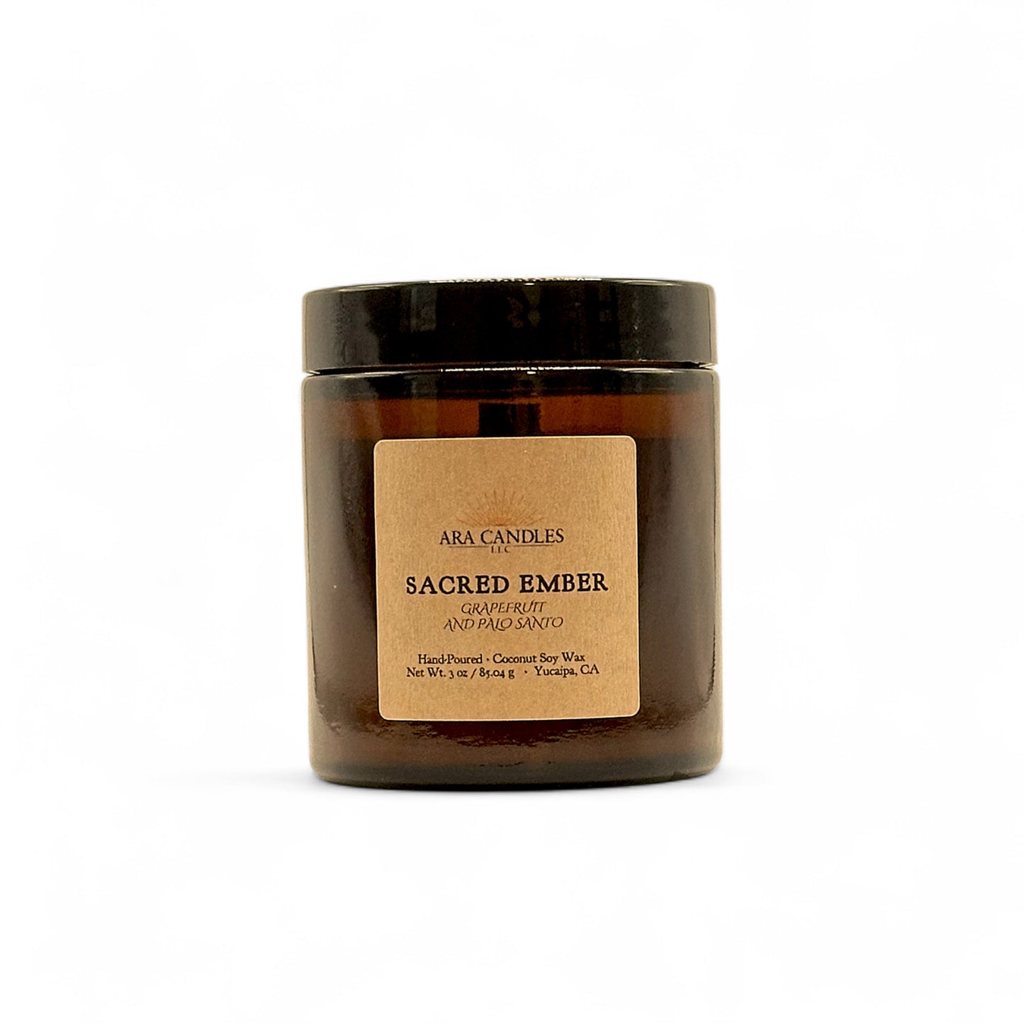 Ara Candles Sacred Ember candle in a glass jar with a brown label on a white background