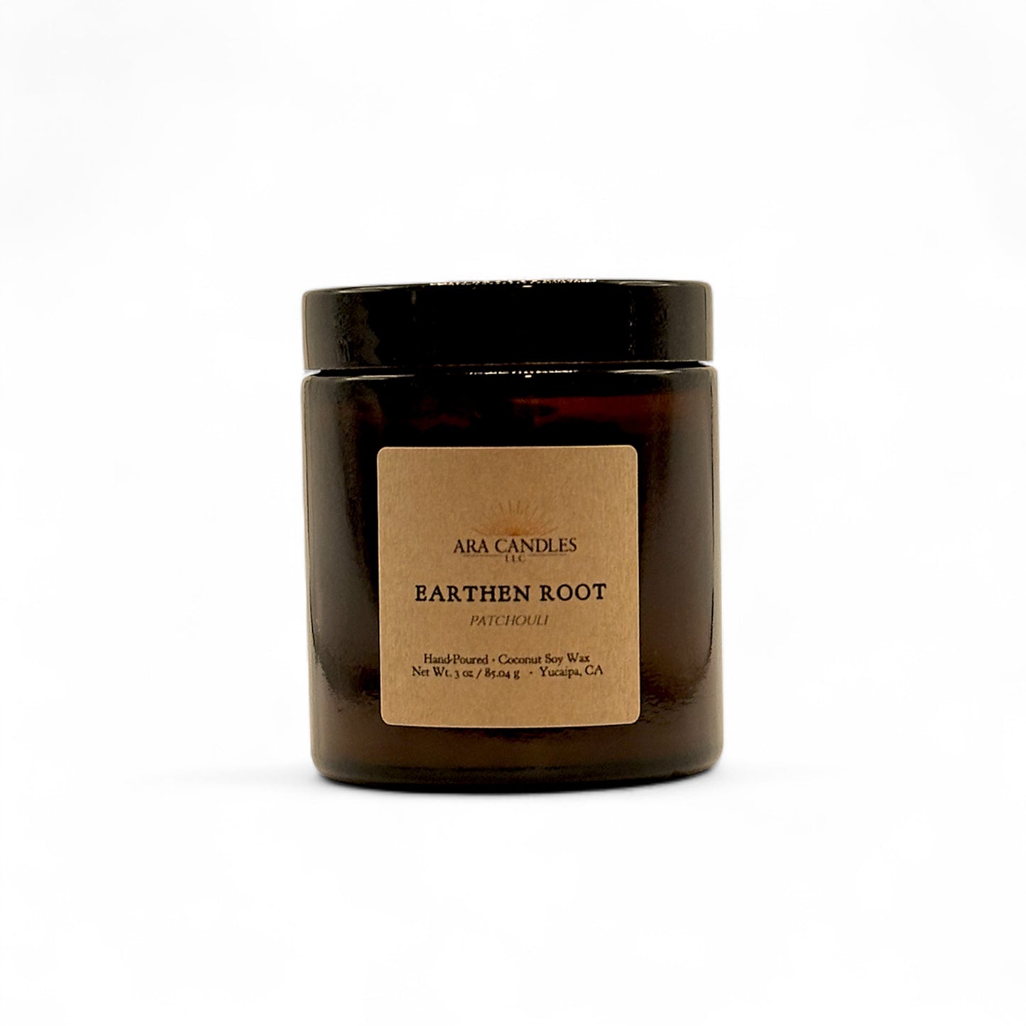 Amber jar candle displayed behind white background.