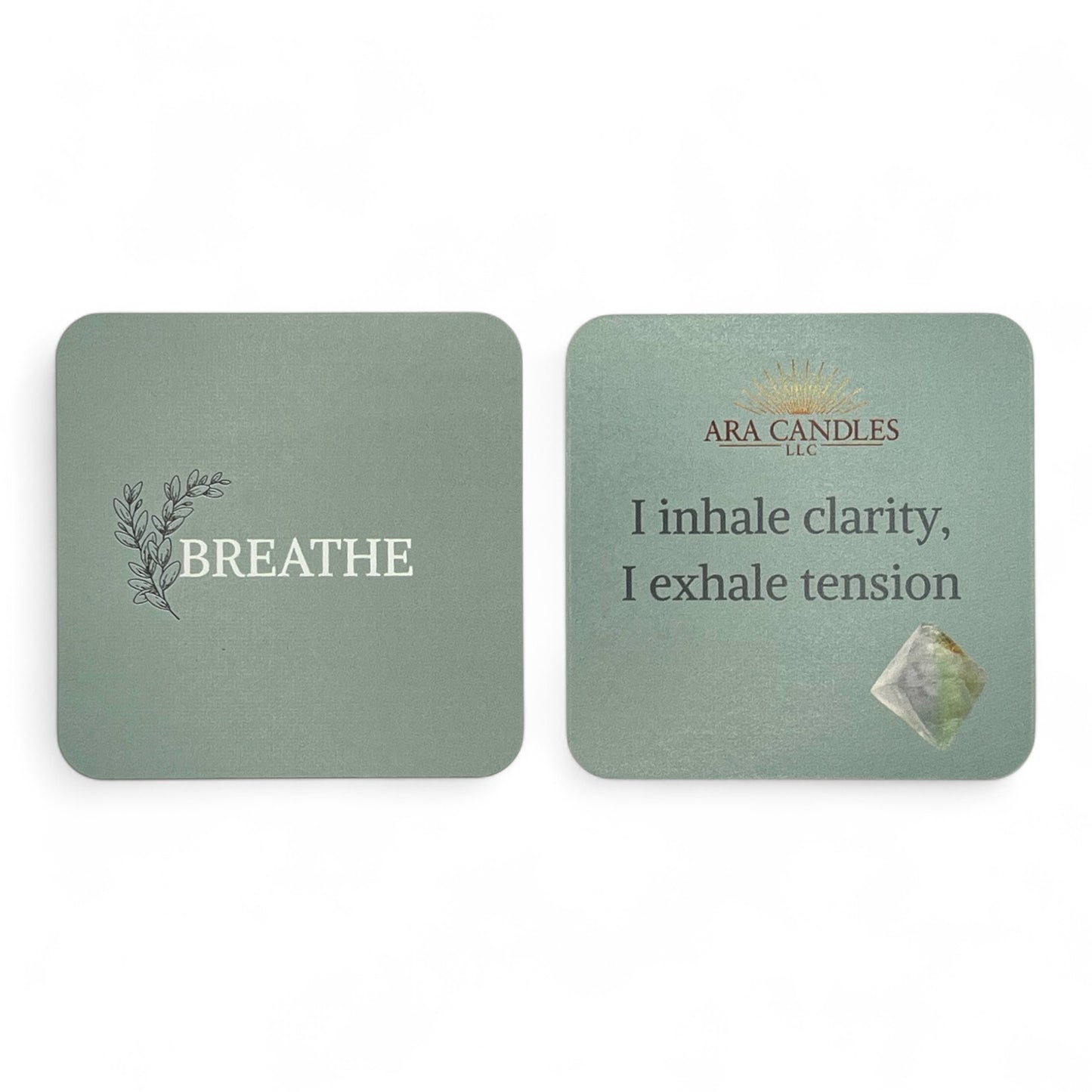 BREATHE affirmation card set from ARA Candles, featuring a calming green tone, leafy botanical artwork, and the quote "I inhale clarity, I exhale tension" with a fluorite crystal.