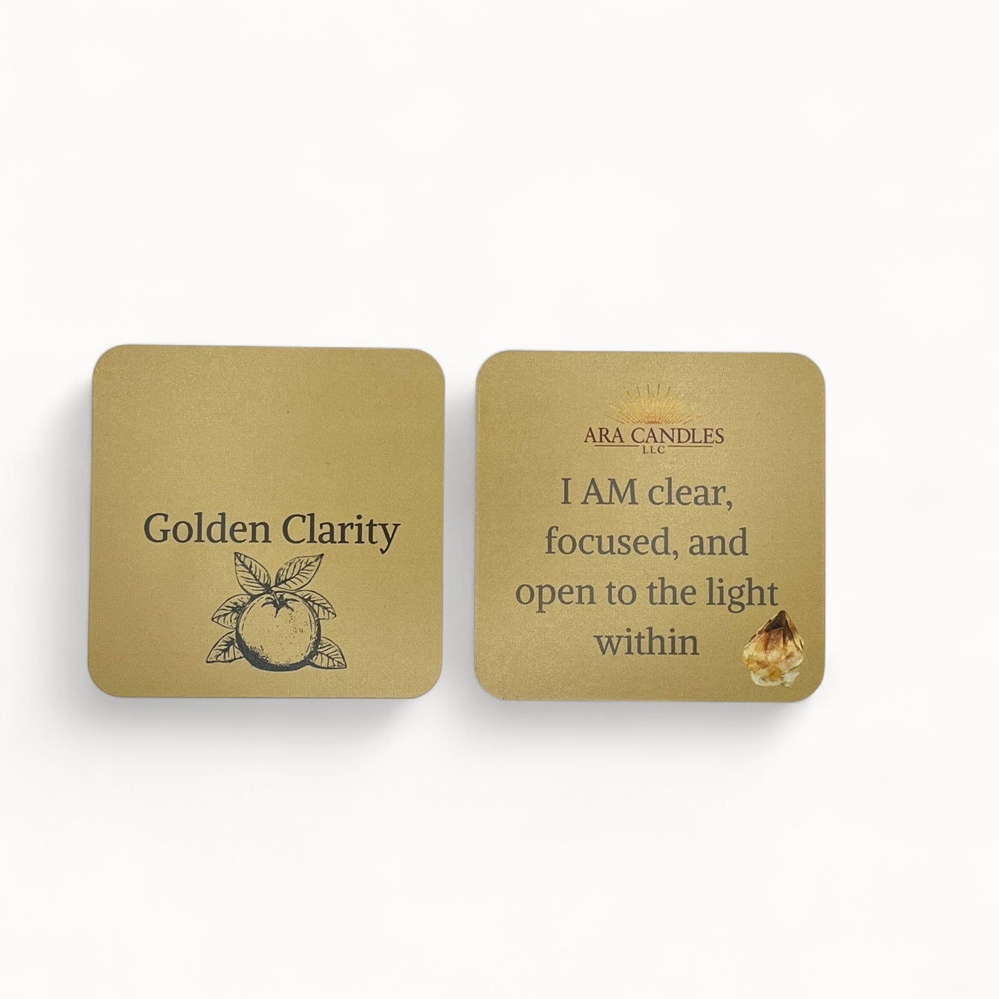 GOLDEN CLARITY affirmation card set from ARA Candles, in warm golden hues with citrus botanical artwork and the quote "I AM clear, focused, and open to the light within" beside a citrine crystal.