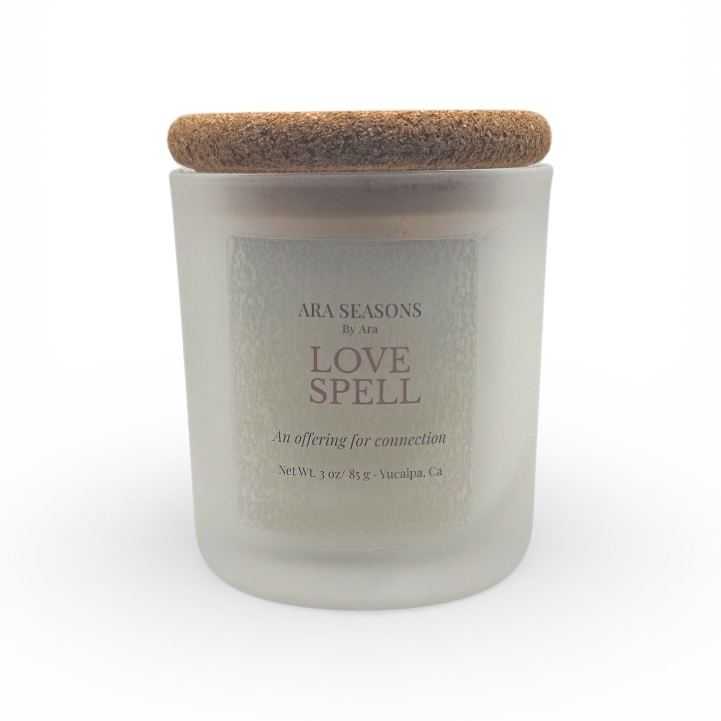 Ara Seasons Love Spell candle is frosted glass jar with cork lid