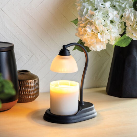 Aurora Candle Lamp with a sleek and modern design, perfect for gently warming candles and creating a warm, inviting atmosphere in any room