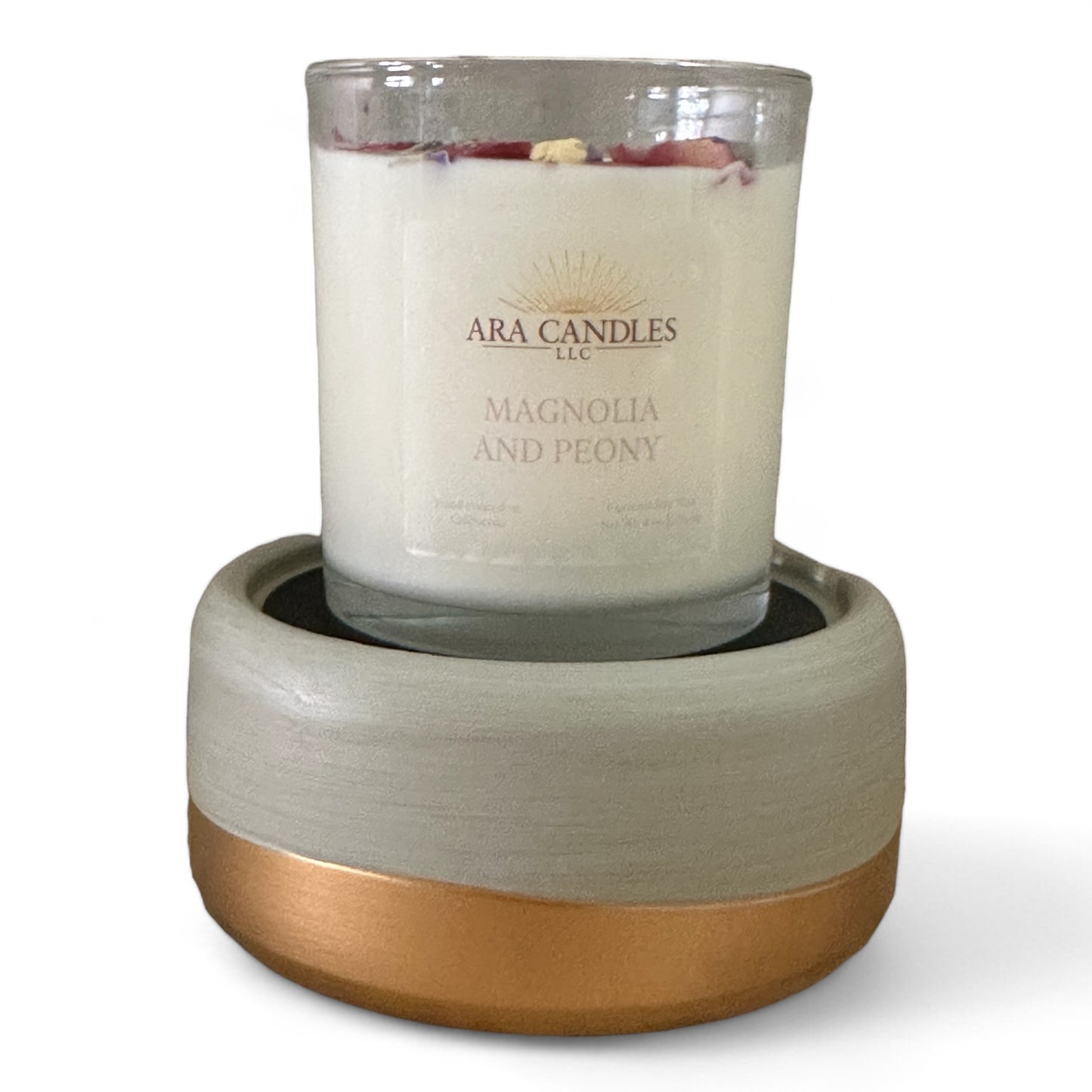 Front view of Magnolia and Peony flameless 8 oz candle on a wax warmer, displayed on a white background, offering a soothing floral fragrance in a flame-free form