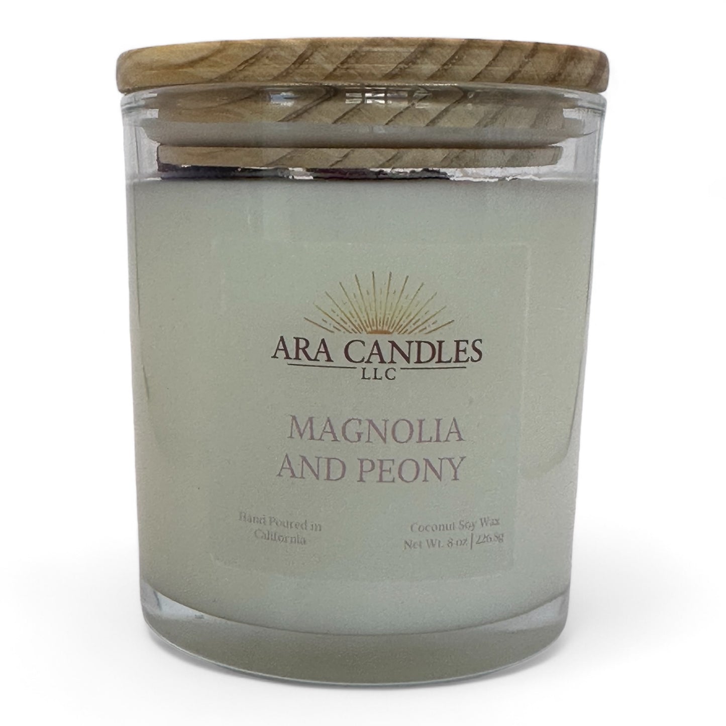 Front view of Magnolia and Peony flameless 8 oz candle with wooden lid, displayed on a white background, offering a soothing floral fragrance in a flame-free form