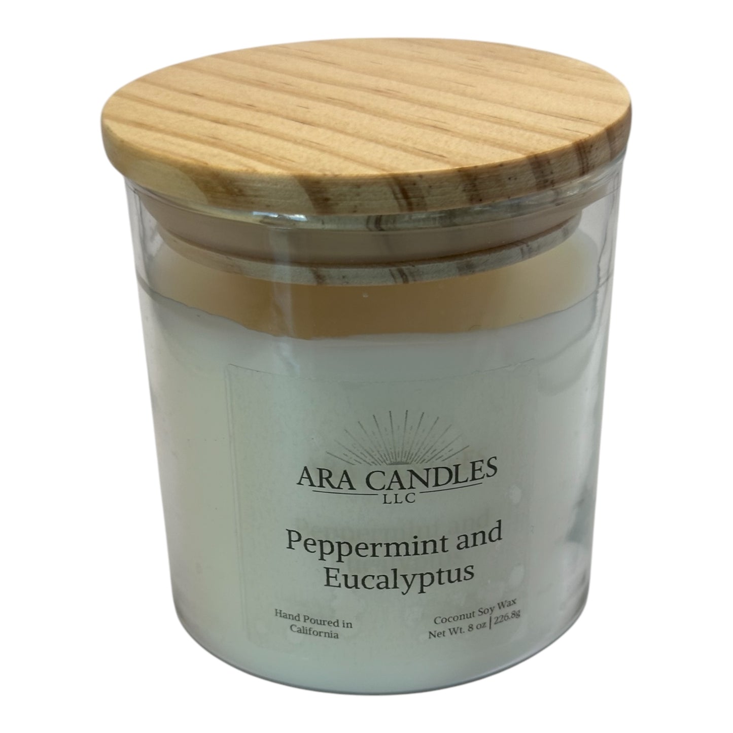 Peppermint Eucalyptus 8 oz flameless candle with a wooden lid, set against a white background, offering a refreshing and invigorating fragrance in a flame-free form
