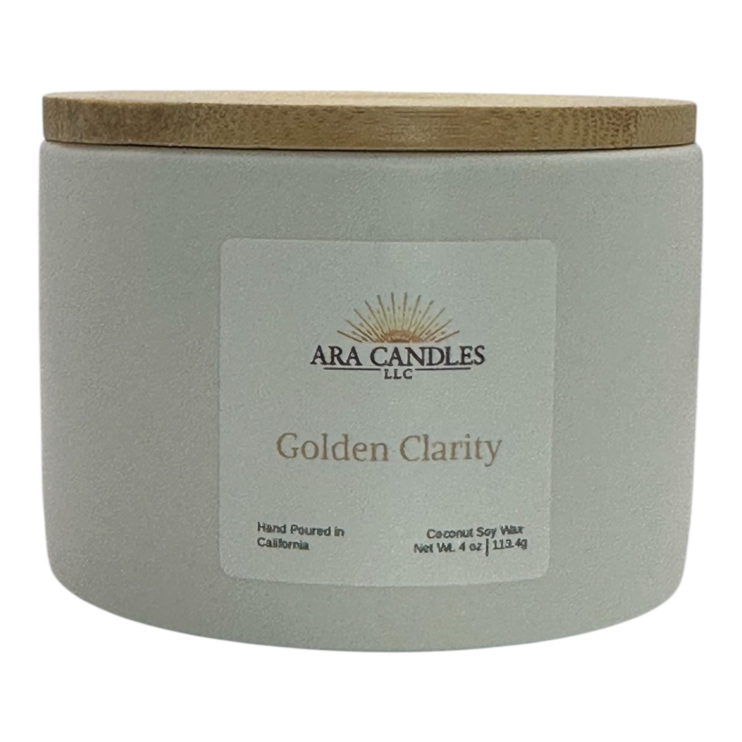 ARA Candles Golden Clarity ritual candle in a ceramic vessel with bamboo lid, crafted for focus and mindful intention.