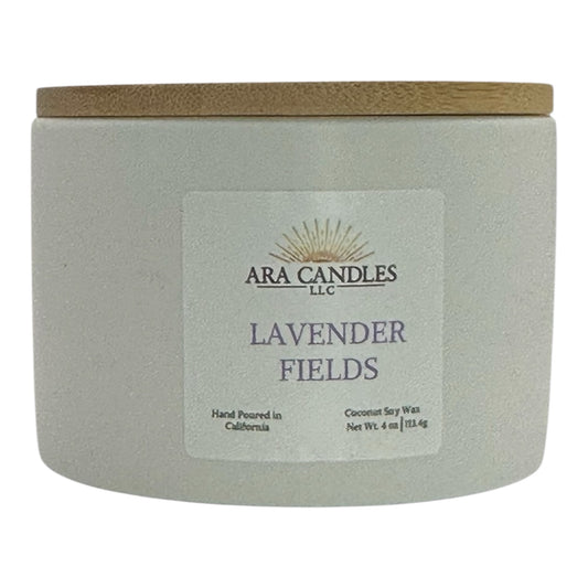 Lavender fields candle by ARA candles, in matte ceramic container with lavender label and bamboo lid.