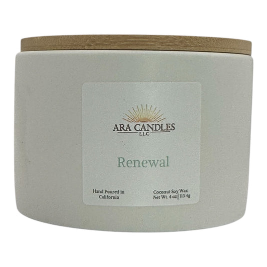ARA Candles Renewal candle in white ceramic jar, designed for emotional reset and seasonal transitions.