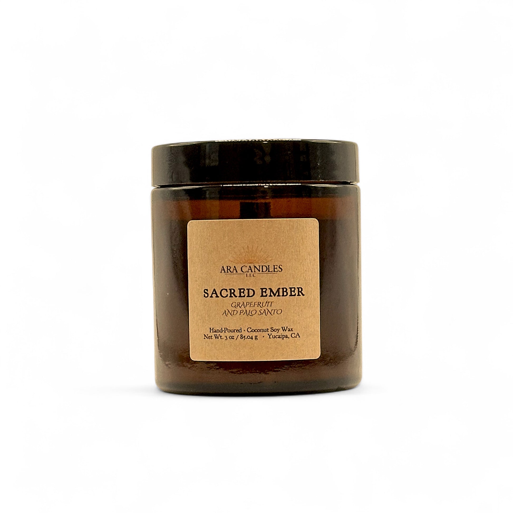 Ara Candles Sacred Ember candle in a glass jar with a brown label on a white background