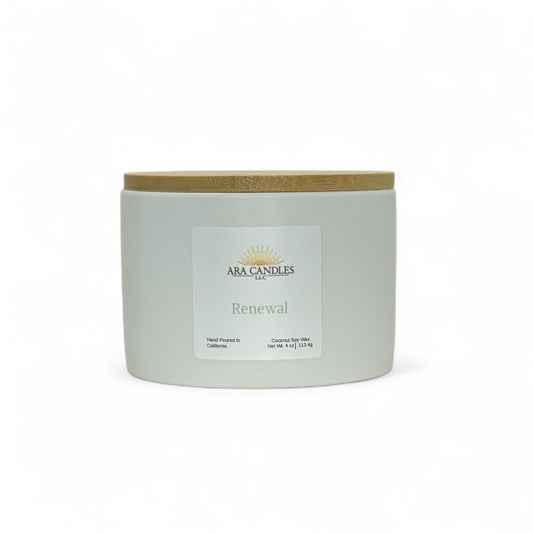 ARA Candles Renewal candle in white ceramic jar, designed for emotional reset and seasonal transitions.