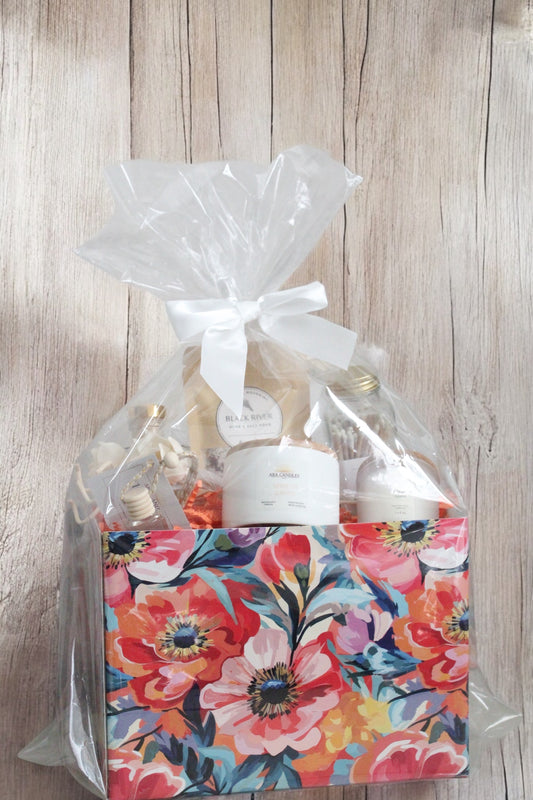 Mother’s Day gift box with Apricot Grove and Citrus Agave candles, matching car diffuser, lemongrass reed diffuser, bath soak, and matches