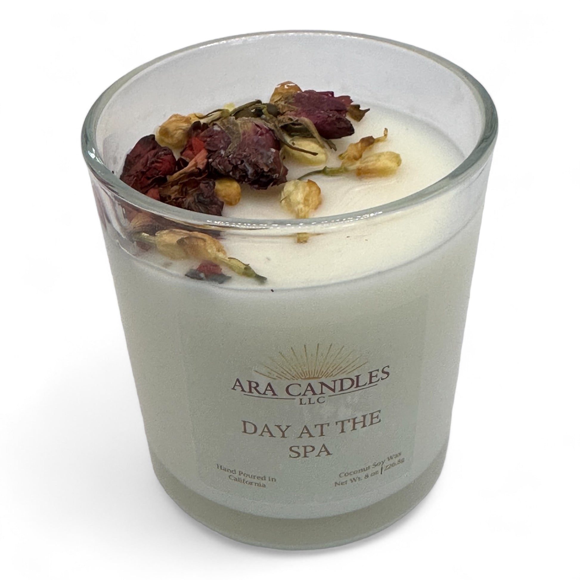 Day at the Spa flameless 8 oz candle with dried roses on top, adding a delicate touch to the soothing spa-inspired fragrance