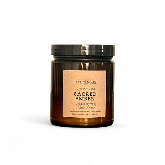 Ara Candles Apothecary Collection Sacred Ember candle, grapefruit and palo Santo fragrance in amber glass for awakening and focus. 