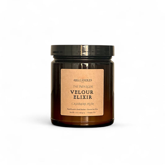 Ara Candles Apothecary Collection Velour Elixir candle, cashmere plum scent in amber glass for indulgence and luxury.