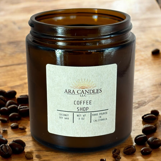 Coffee Shop 7 oz candle with a wooden wick, offering a rich, aromatic coffee fragrance and a cozy, crackling sound as it burns, perfect for creating a warm, inviting atmosphere