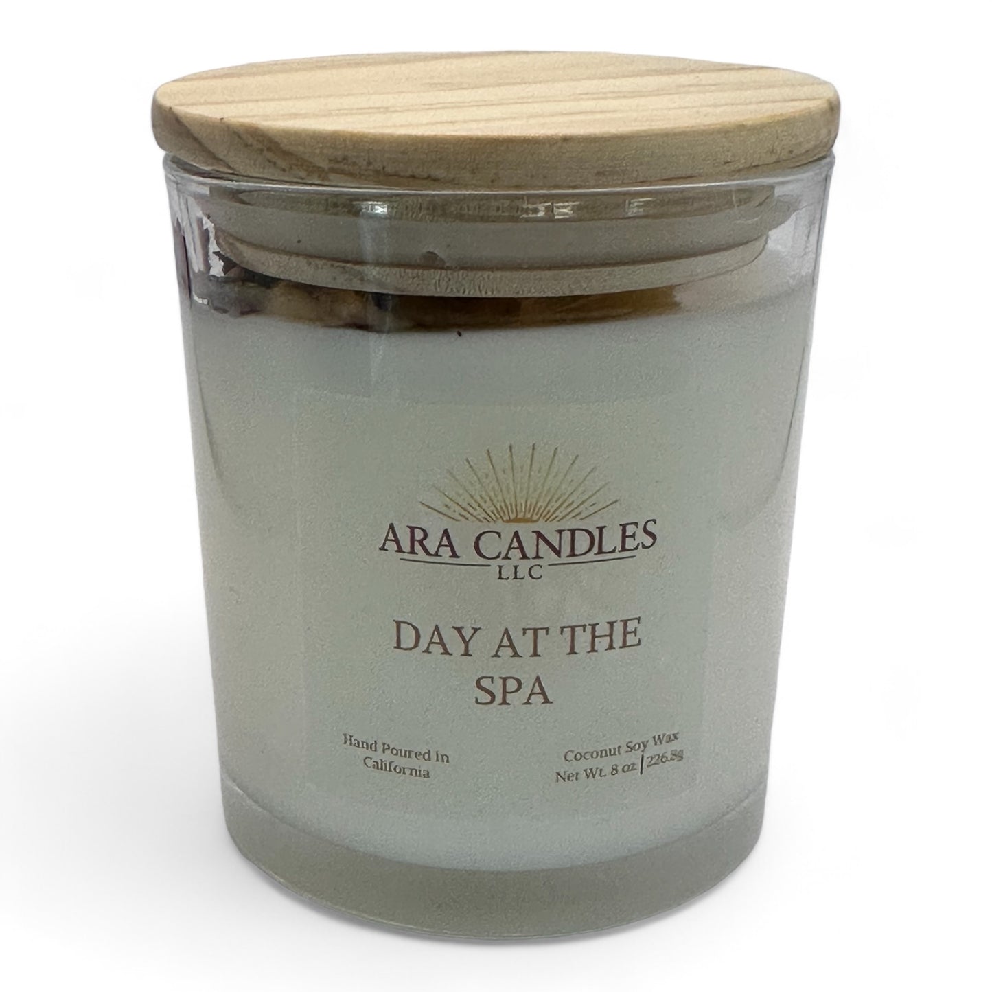 Day at the Spa flameless 8 oz candle with a wooden lid, offering a soothing spa fragrance, elegantly displayed on a white background for a clean and calming look