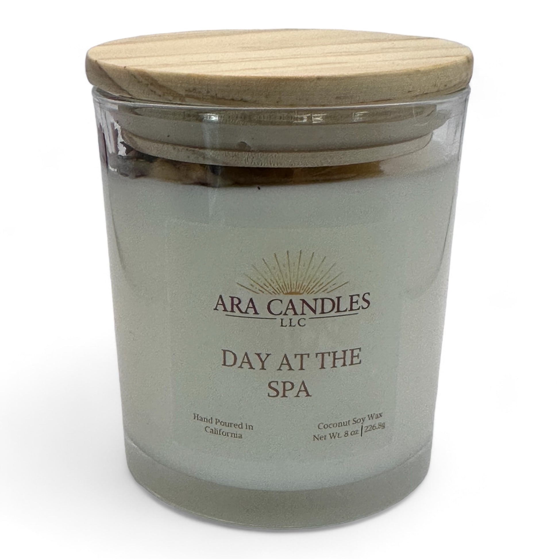 Day at the Spa flameless 8 oz candle with a wooden lid, offering a soothing spa fragrance, elegantly displayed on a white background for a clean and calming look