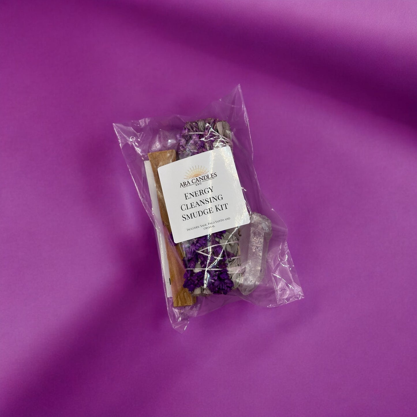 Energy Cleansing Smudge Kit including sage, palo santo, and other tools for purifying and balancing energy in your space