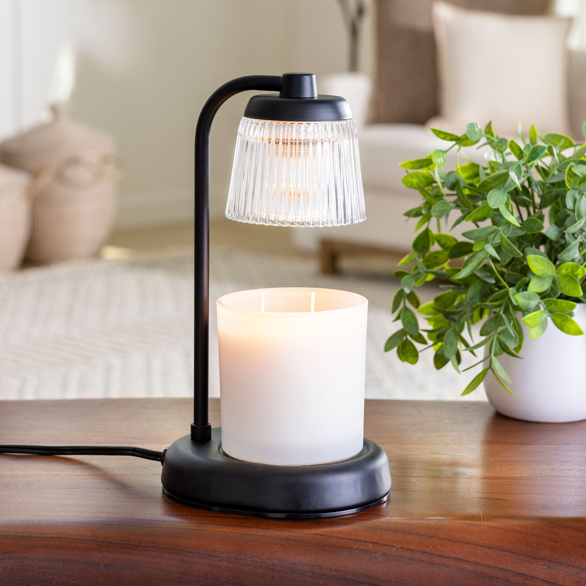 Fluted Glass Black Candle Warmer Lamp in a stylish home setting, featuring a sleek black base and elegant fluted glass design, perfect for melting candles and enhancing your living space with soothing fragrance