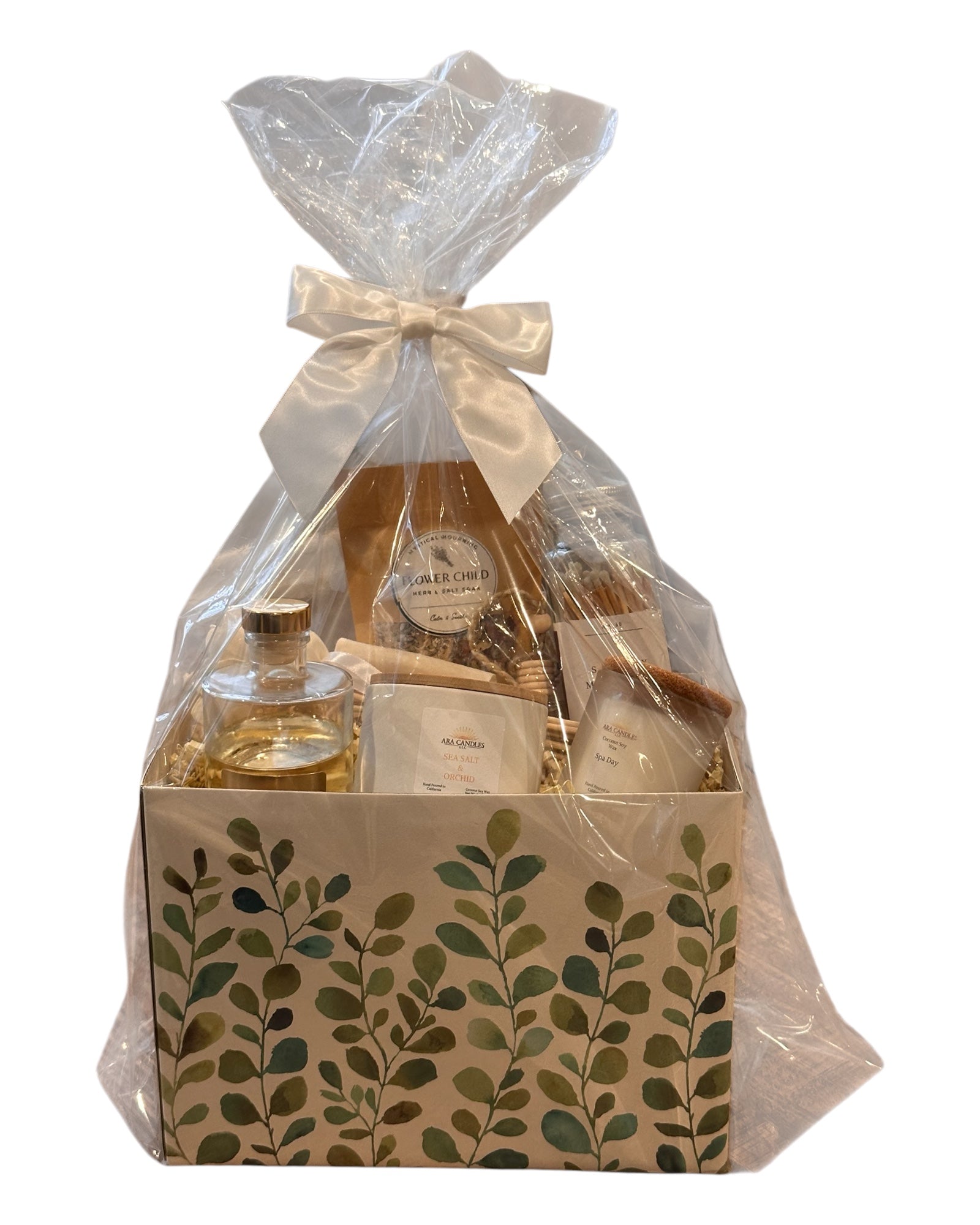 Housewarming Wellness Basket with scented candles, reed diffusers, and bath salts for relaxation