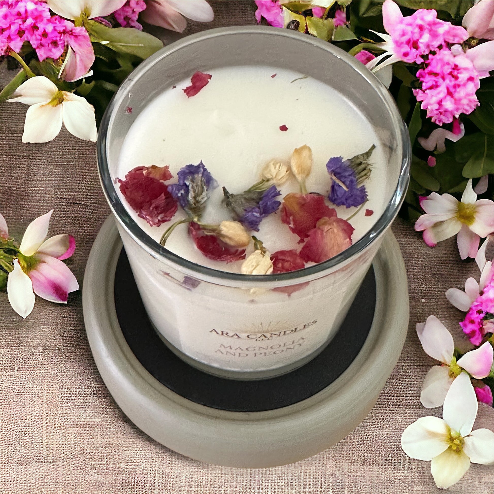 Top view of Magnolia and Peony flameless 8 oz candle on a wax warmer, offering a soothing floral scent and creating a cozy, flame-free ambiance