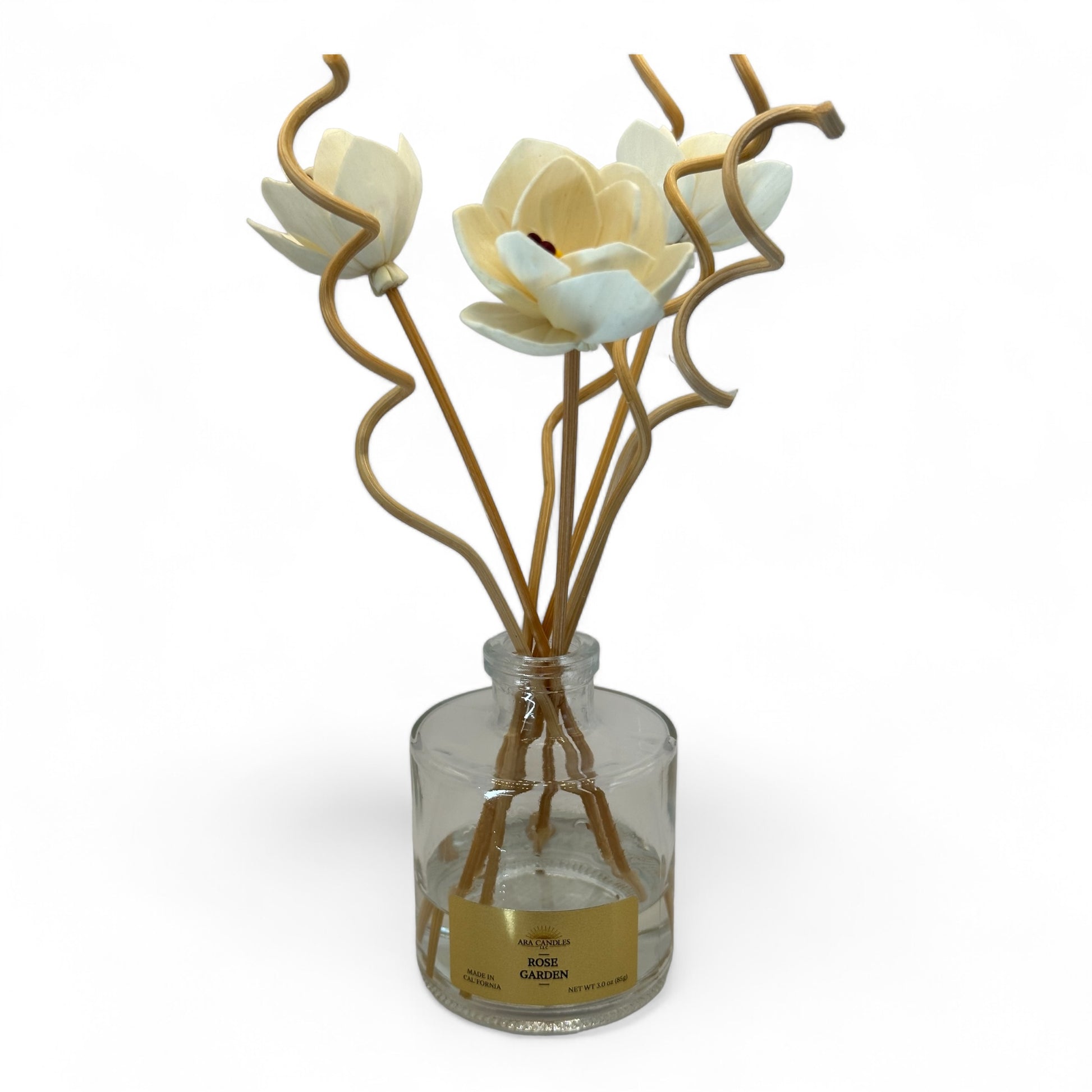 Rose Garden reed diffuser with flower-shaped wooden sticks and spiral reeds, featuring a sweet floral rose fragrance, displayed on a white background for a sophisticated and calming look